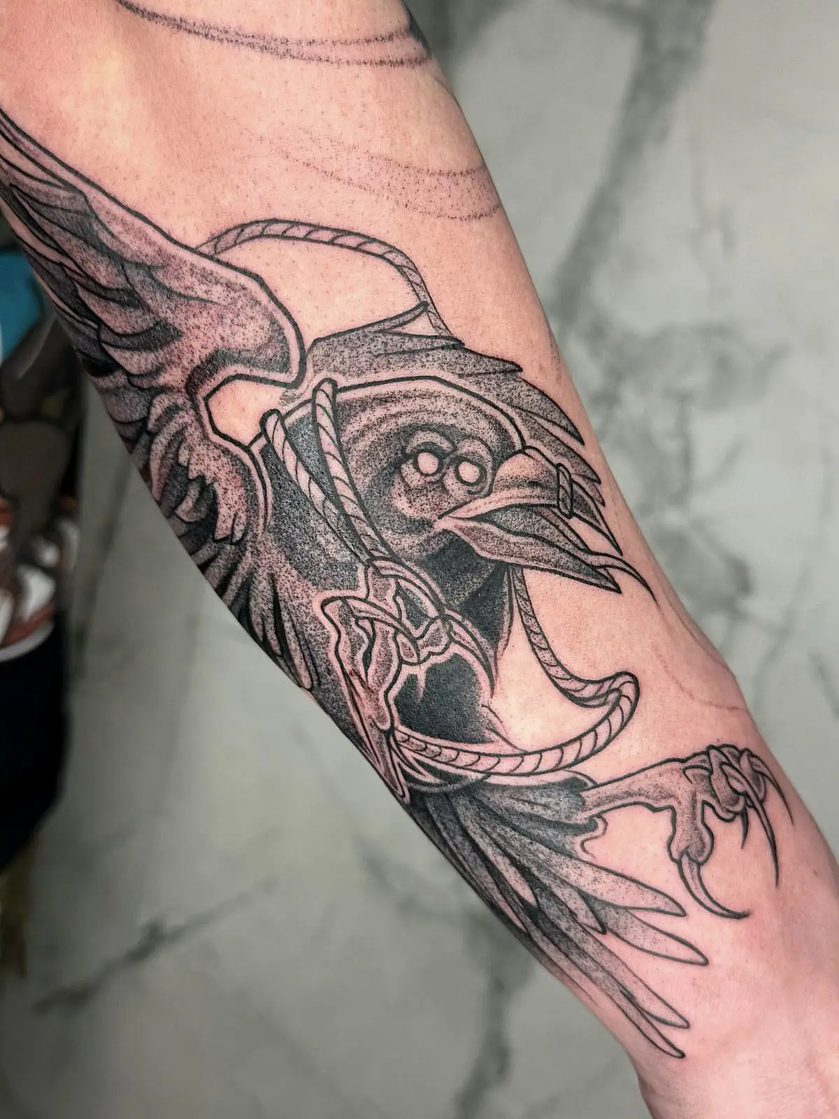 Малюнок орла й формі тату на руці